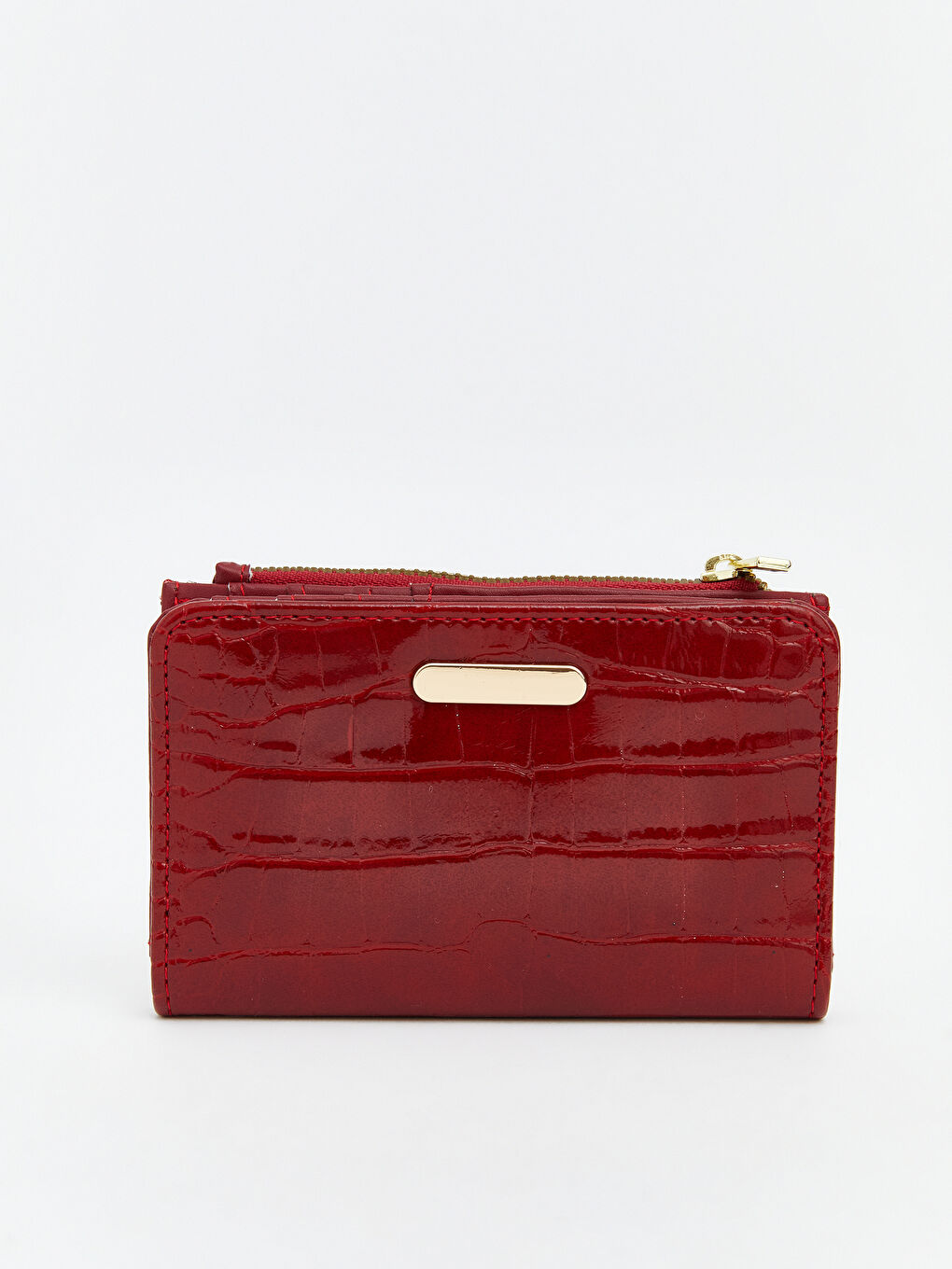 ქალი წითელი საფულე