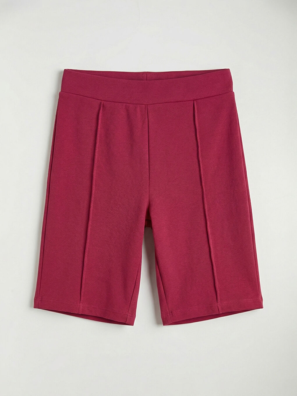 გოგონა ვარდისფერი ელასტიკი