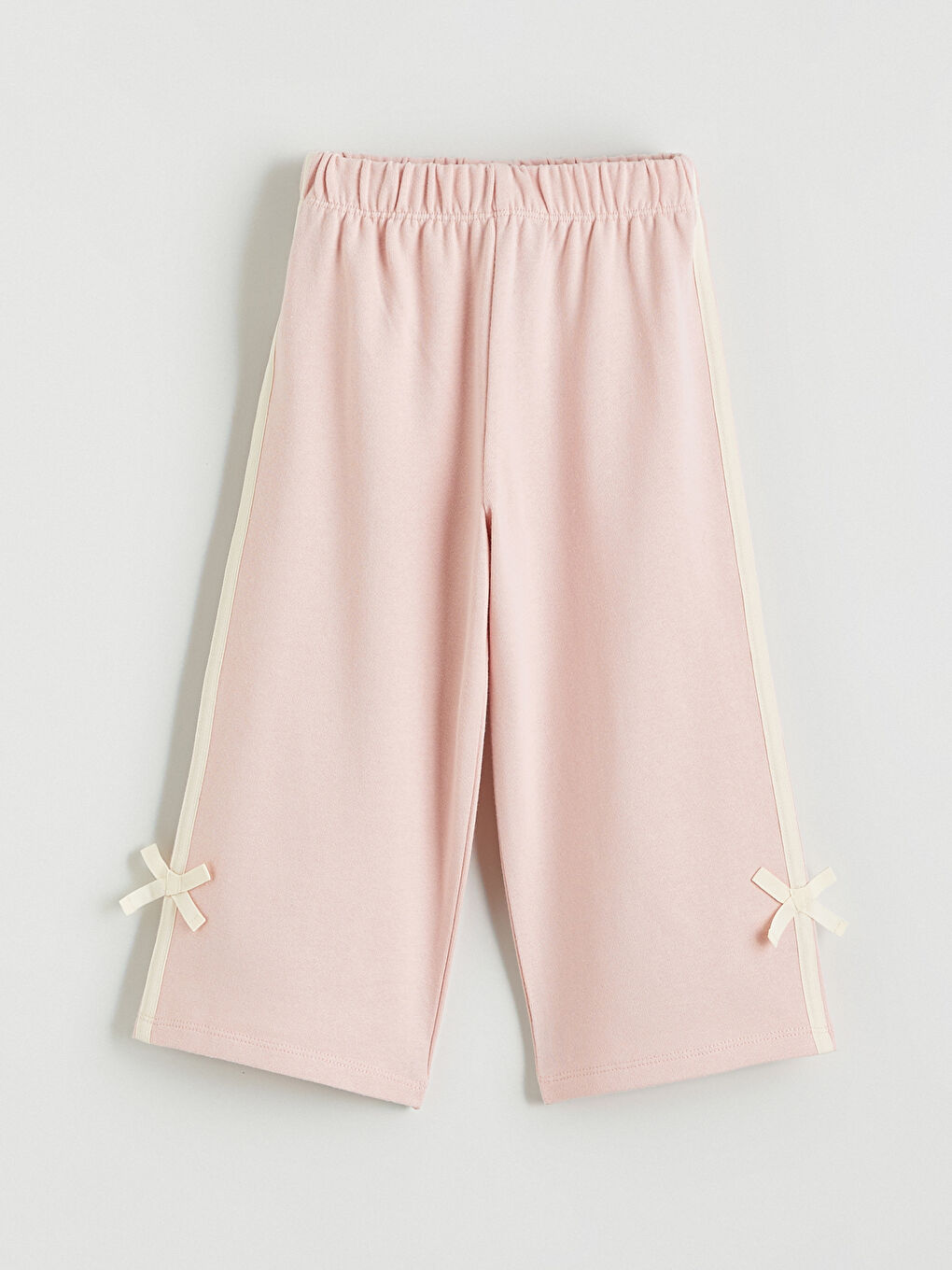 Donji deo trenerke sa elastičnim strukom i detaljem mašne za bebe devojčice