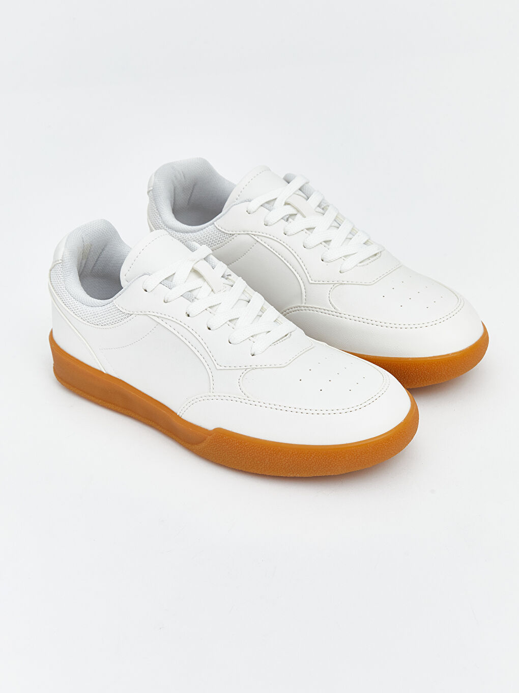 پێڵاوی وەرزشی سپی ژن