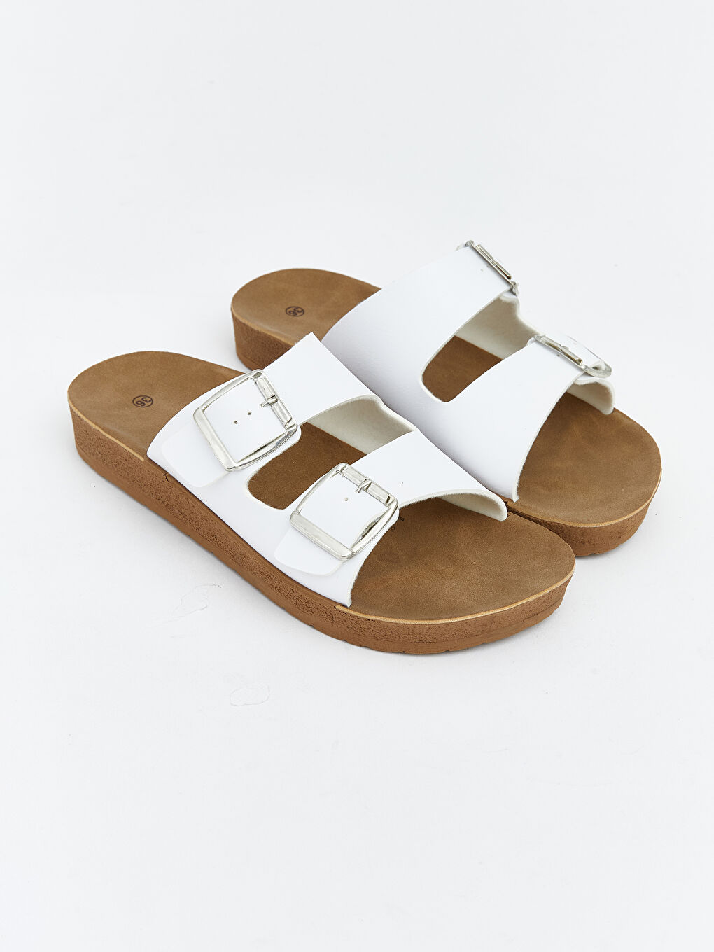 شرائح نسائية بحزامين ونعل سميك