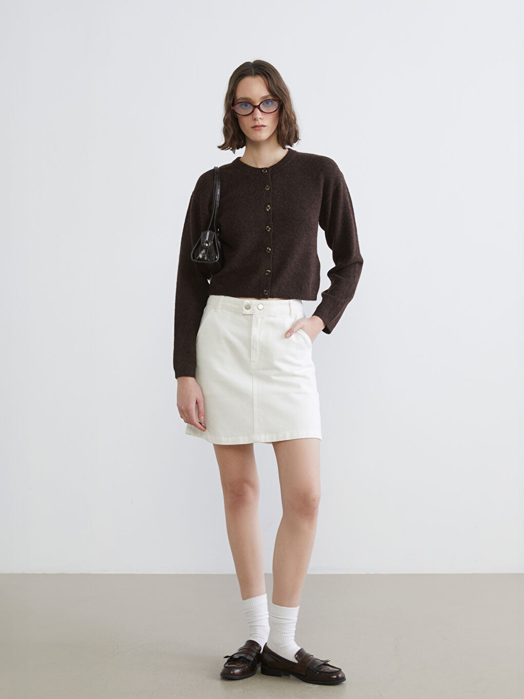 ქალის მრგვალი ყელიანი ნაქსოვი კარდიგანი-1