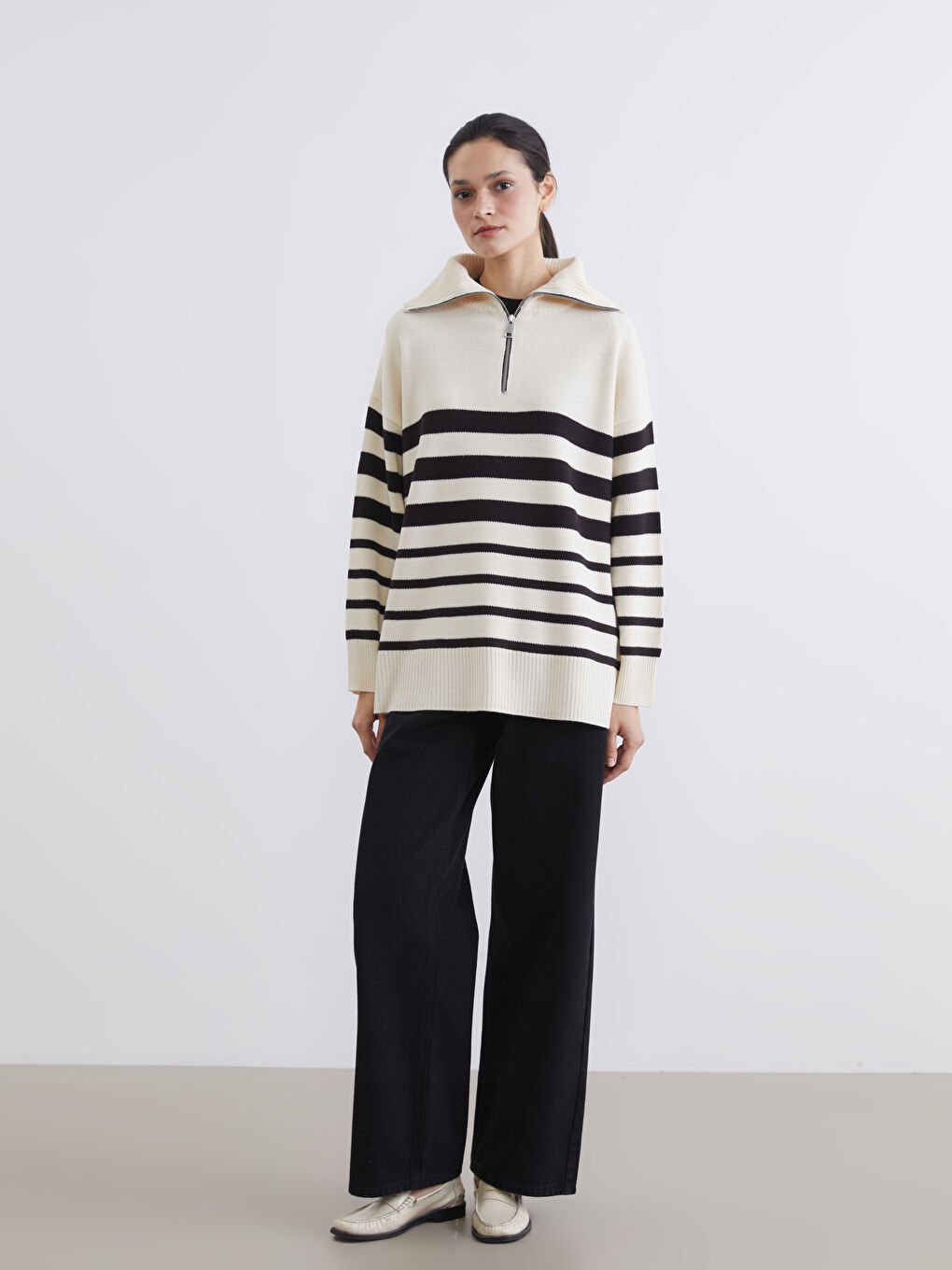 Striped oversized knit tunic with a stand-up collar.-1