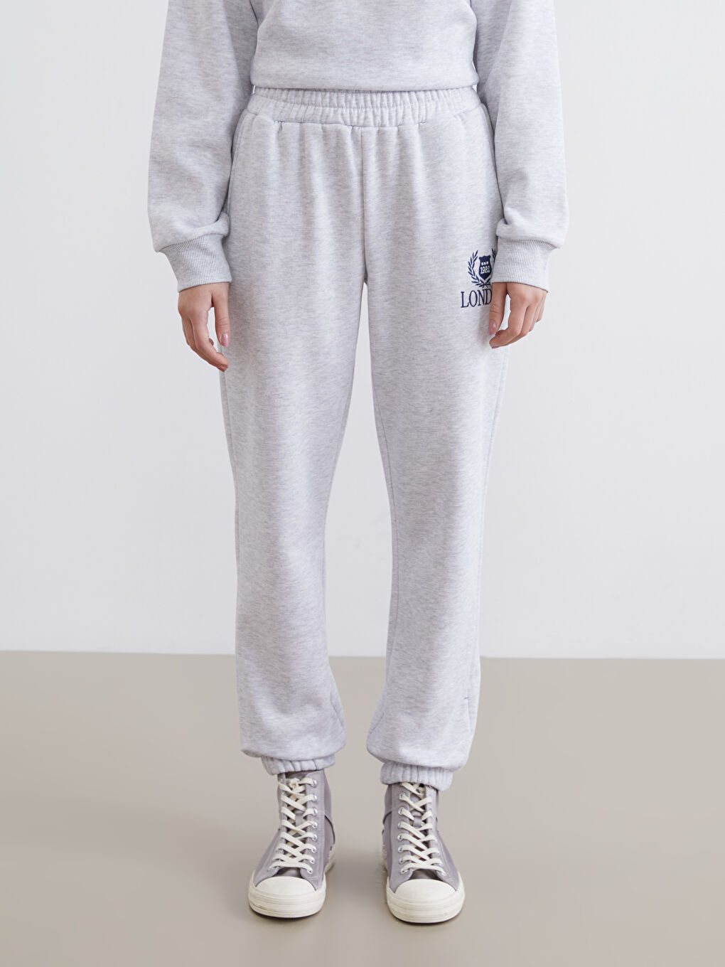 بنطال رياضي رياضي رمادي امرأة-1