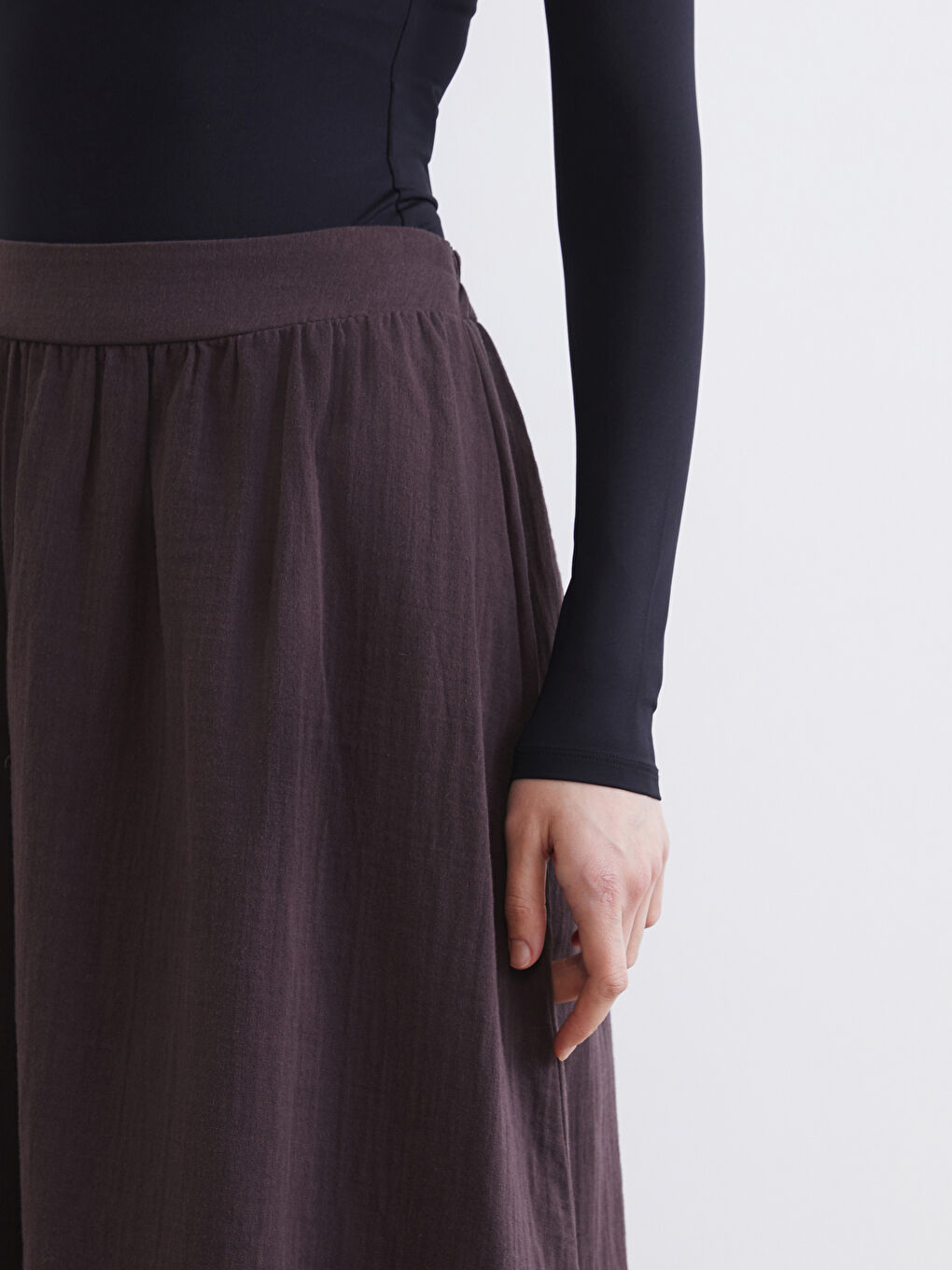 تەنورە قاوه‌یی ژن-2