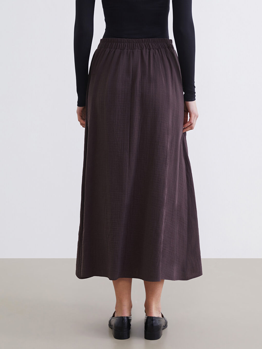 تەنورە قاوه‌یی ژن-3