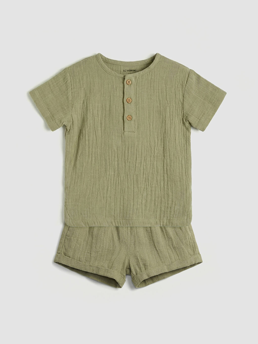 მრგვალი საყელოს ჩვილი ბიჭის მუსლინის მაისური და შორტები