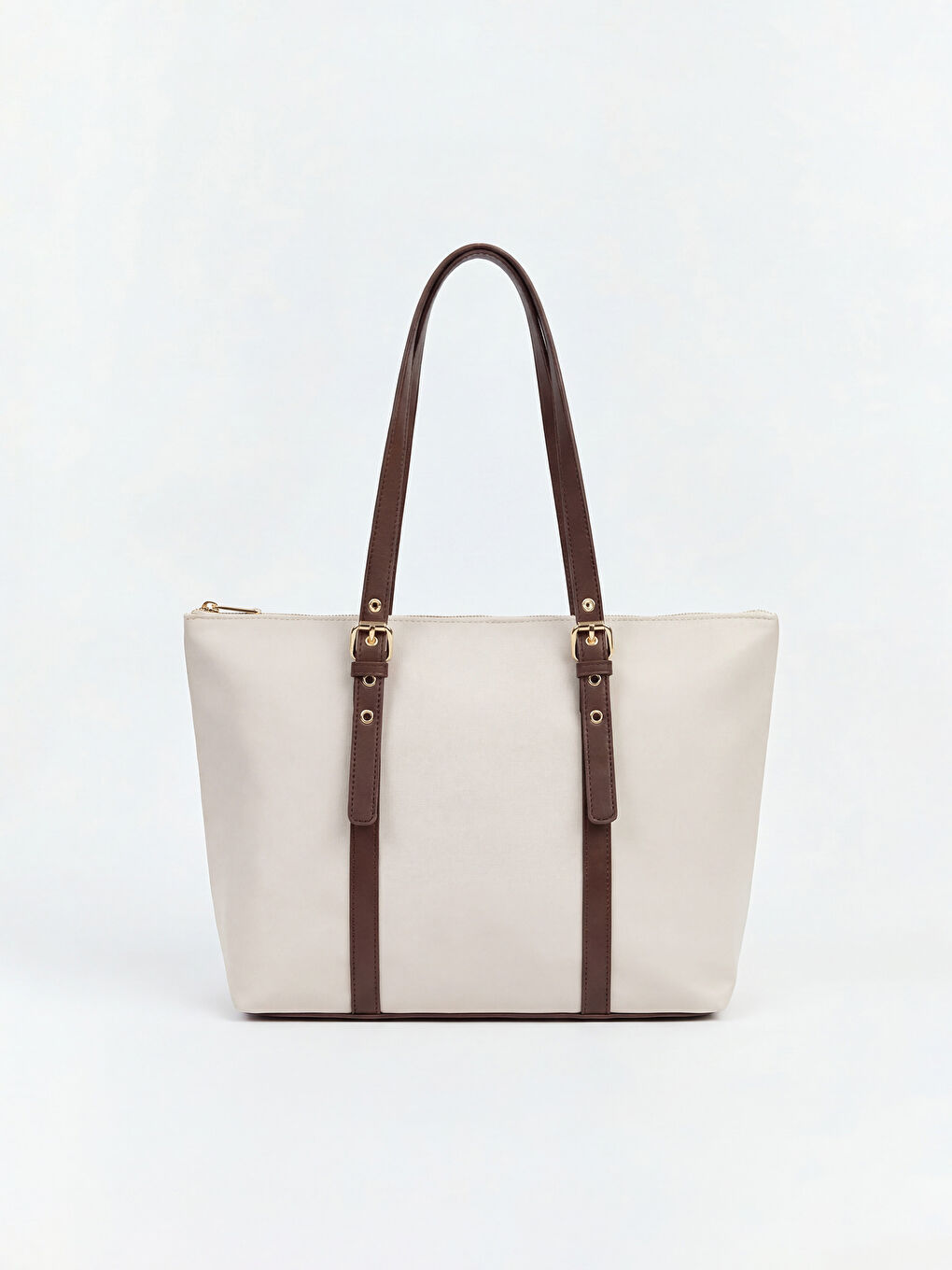 ქალი კრემისფერი მხრის ჩანთა