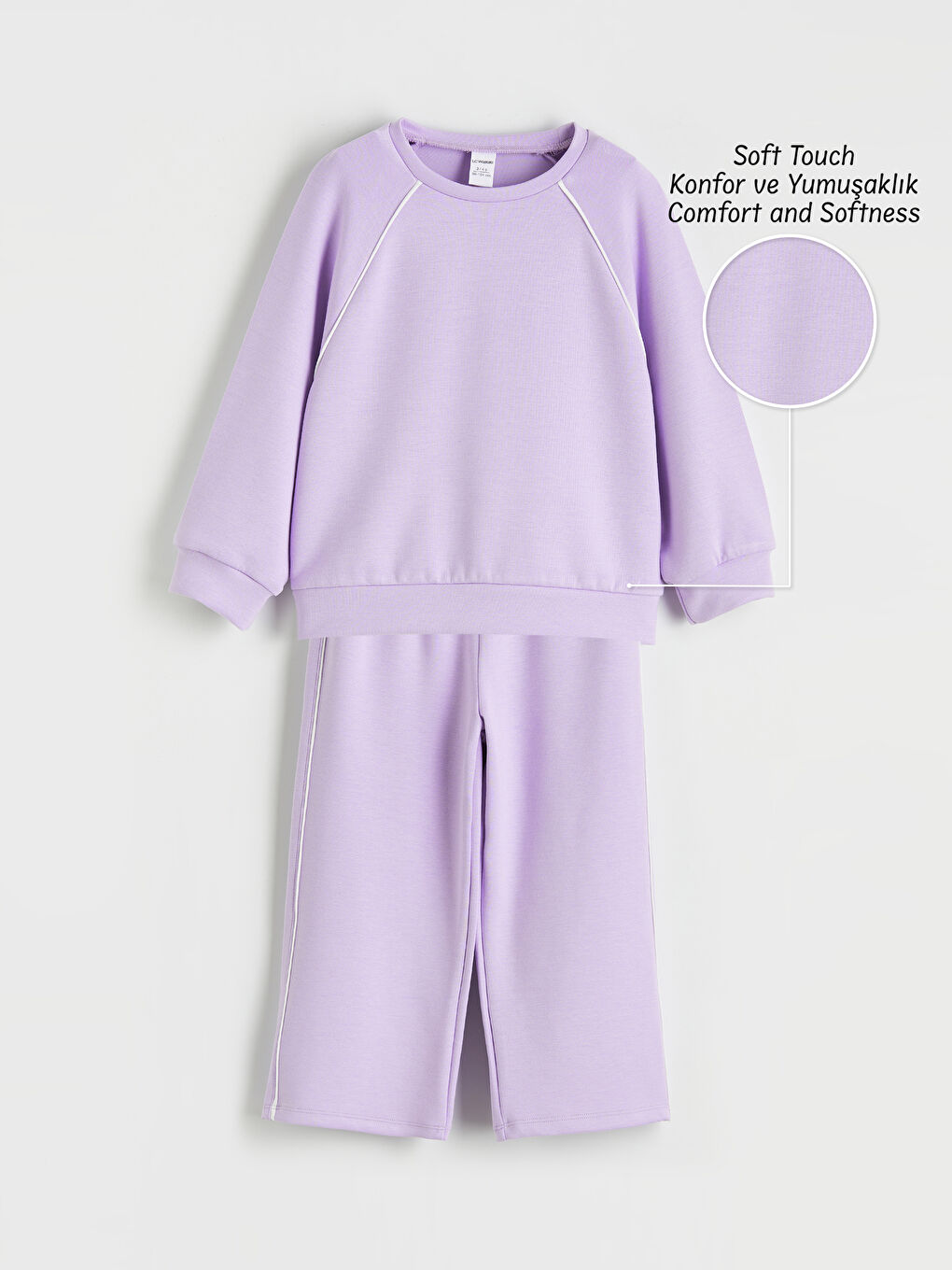 Girls' crew neck soft touch sweatshirt and sweatpants set.
