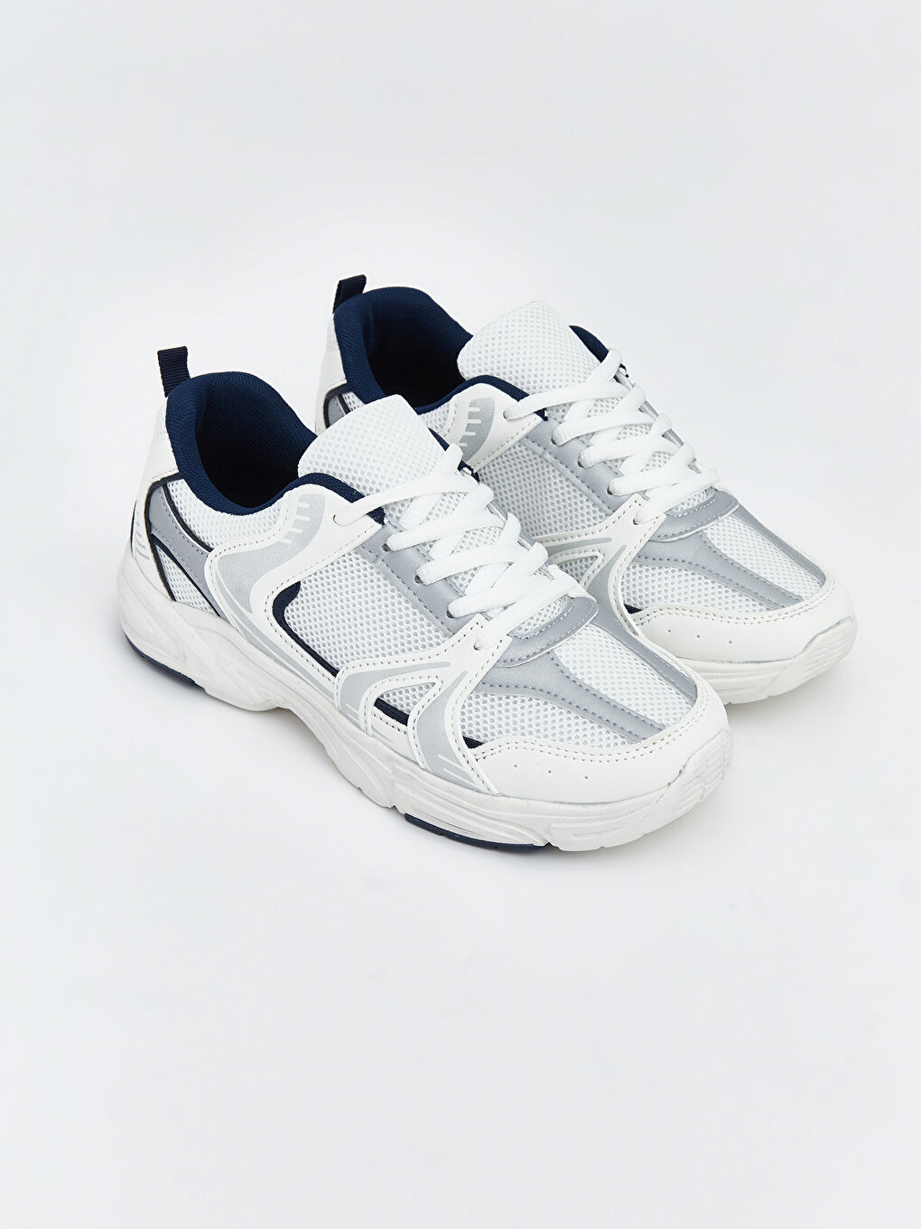 پێڵاوی ڕاهێنەران قەیتان بۆ کچان