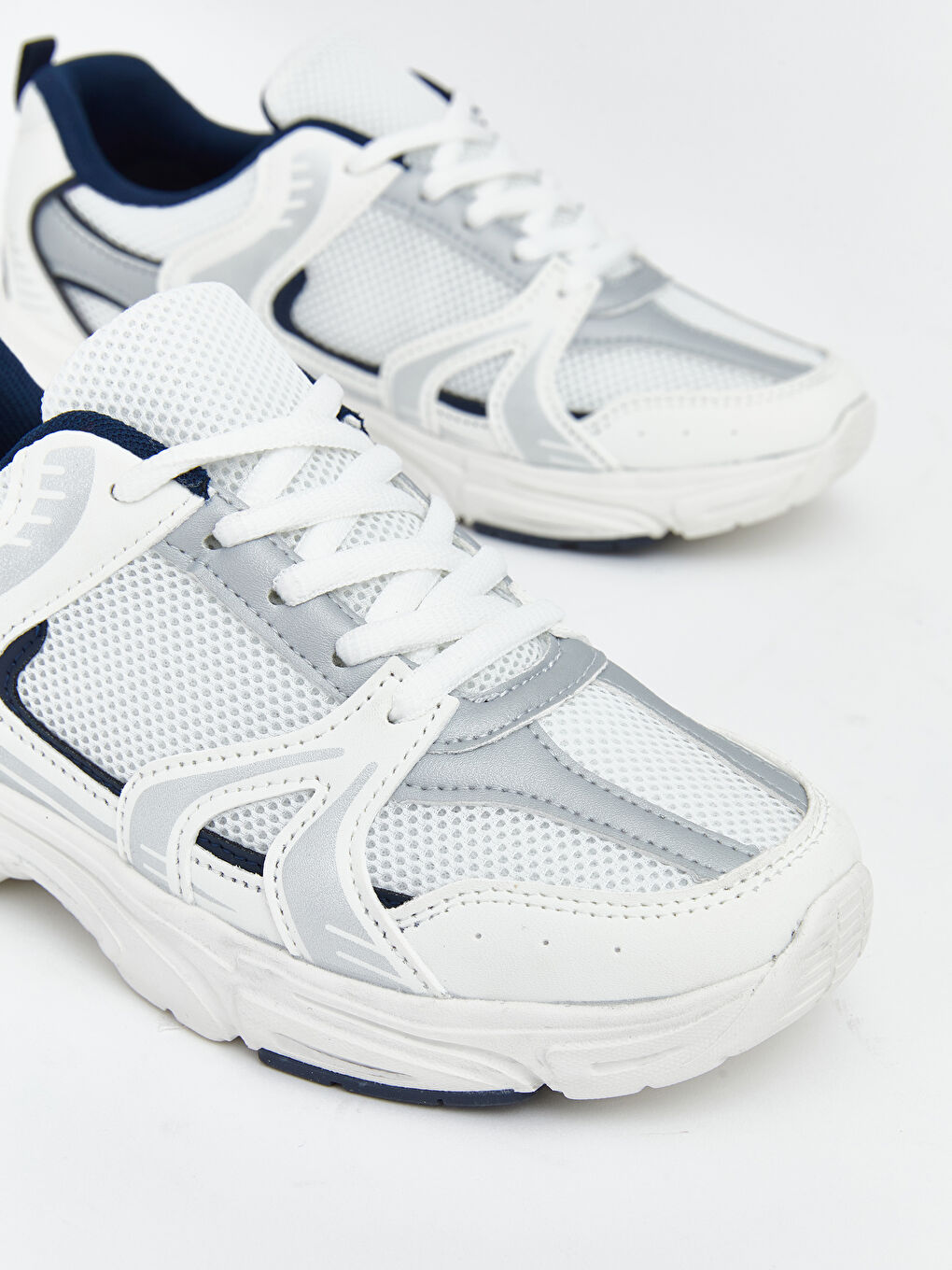 پێڵاوی ڕاهێنەران قەیتان بۆ کچان-2