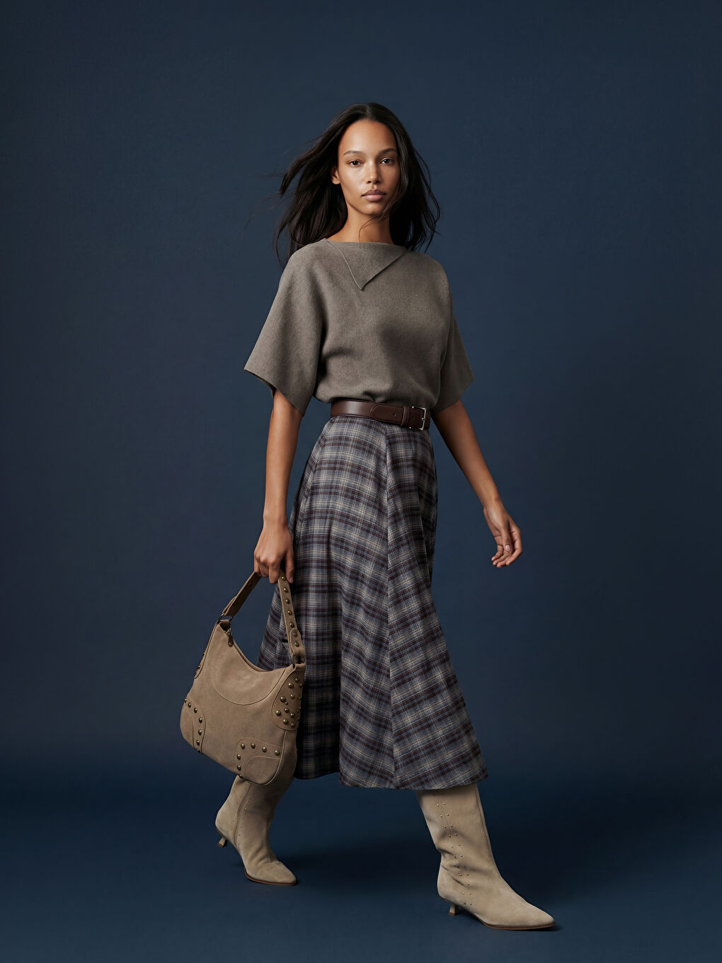 تەنورە قاوه‌یی ژن