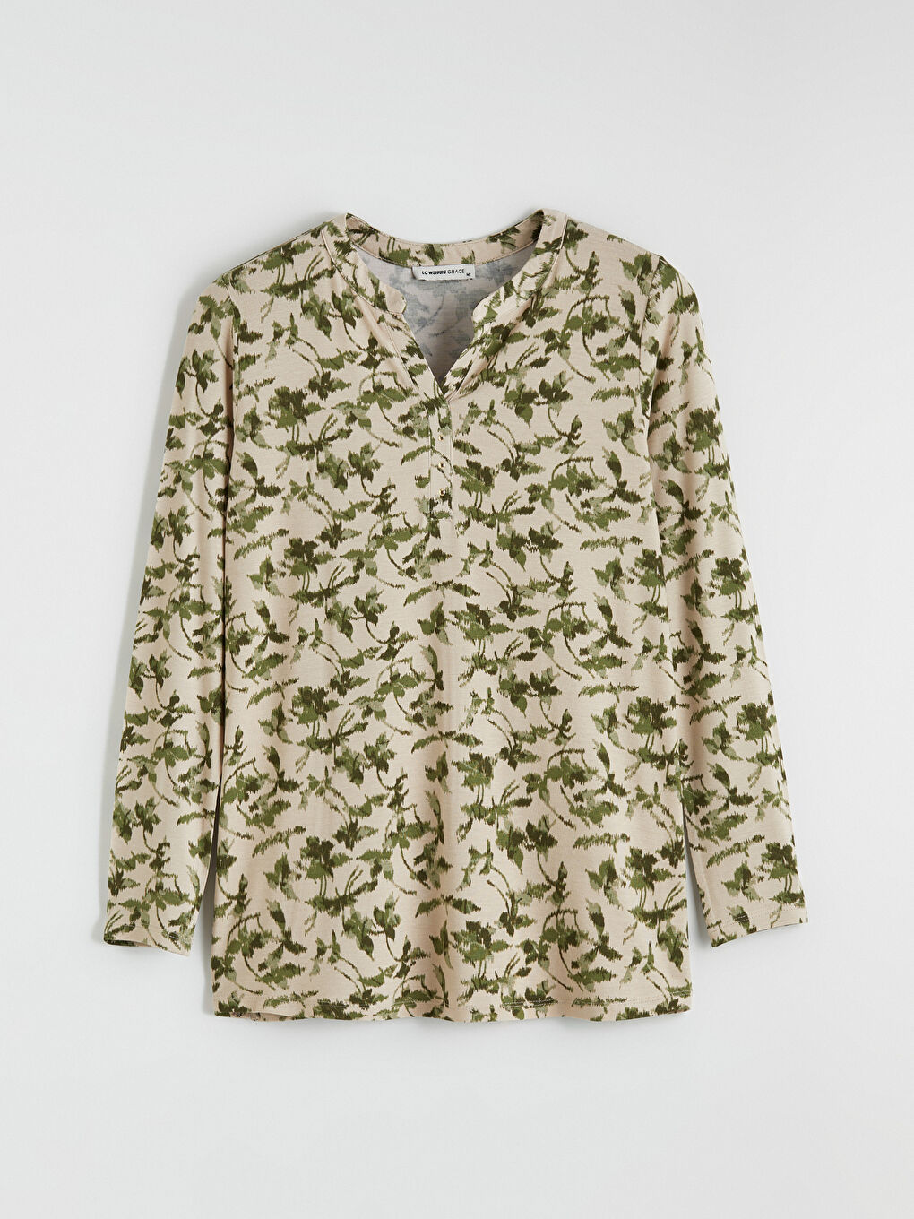 Floral blouse with an asymmetrical neckline.-3