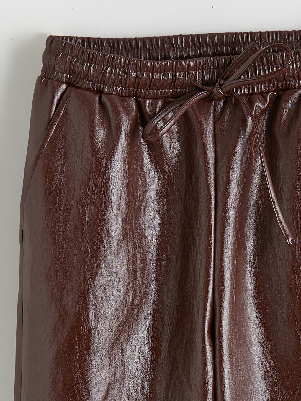 Pantalone od eko kože sa elastičnim strukom za ženski-5