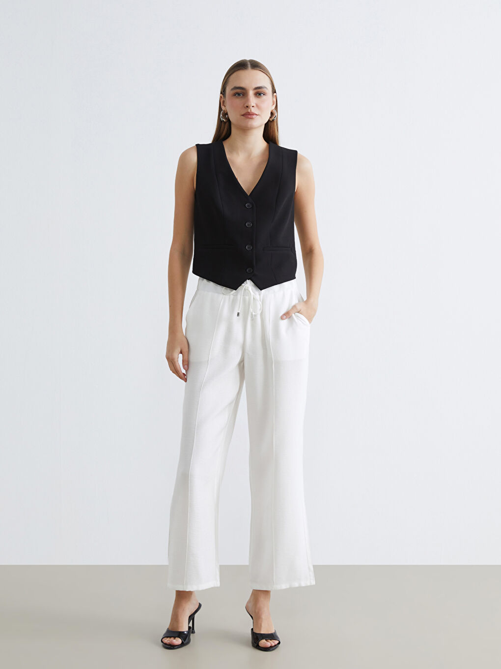 Ekru Beli Lastikli Dokulu Kadın Pantolon	