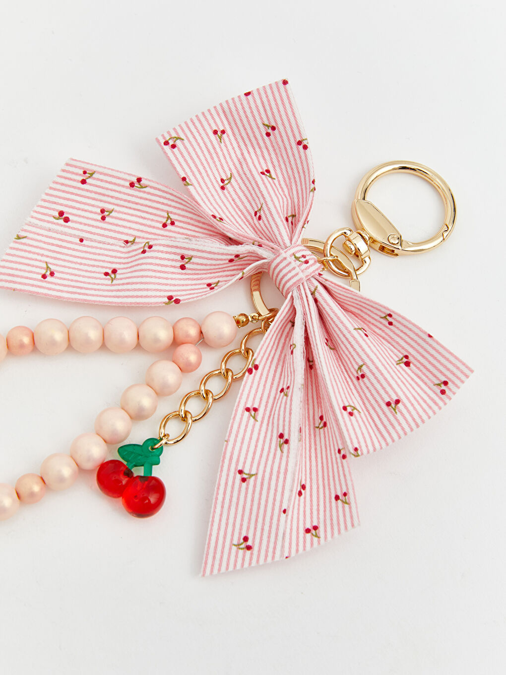 ბაფთიანი დეტალებით ჩანთის ბრელოკი-1