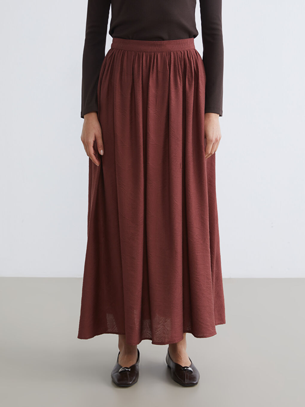 Kahverengi Beli Lastikli Desenli Kloş Etek-1