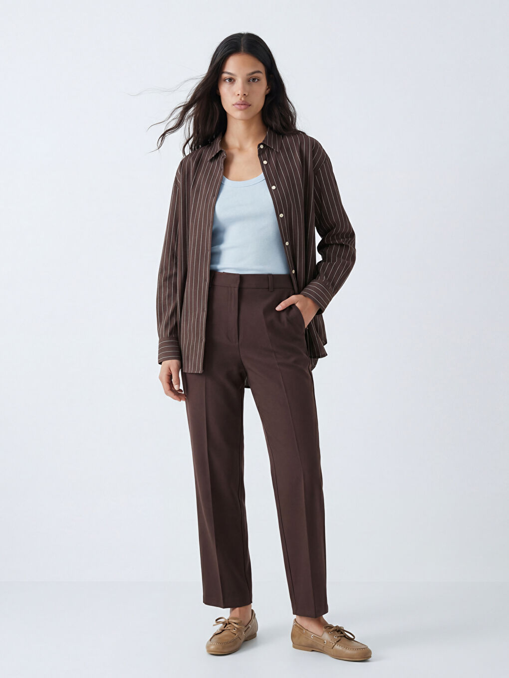 قميص نسائي واسع بخطوط.