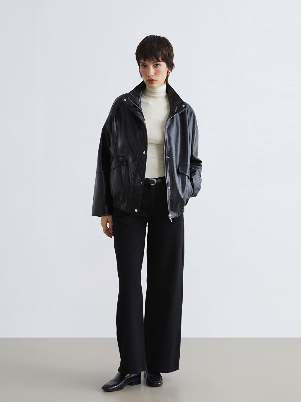 جاكيت جلد صناعي أسود امرأة-1