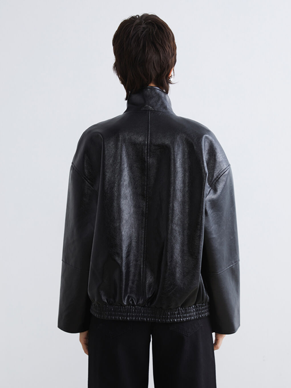 جاكيت جلد صناعي أسود امرأة-4