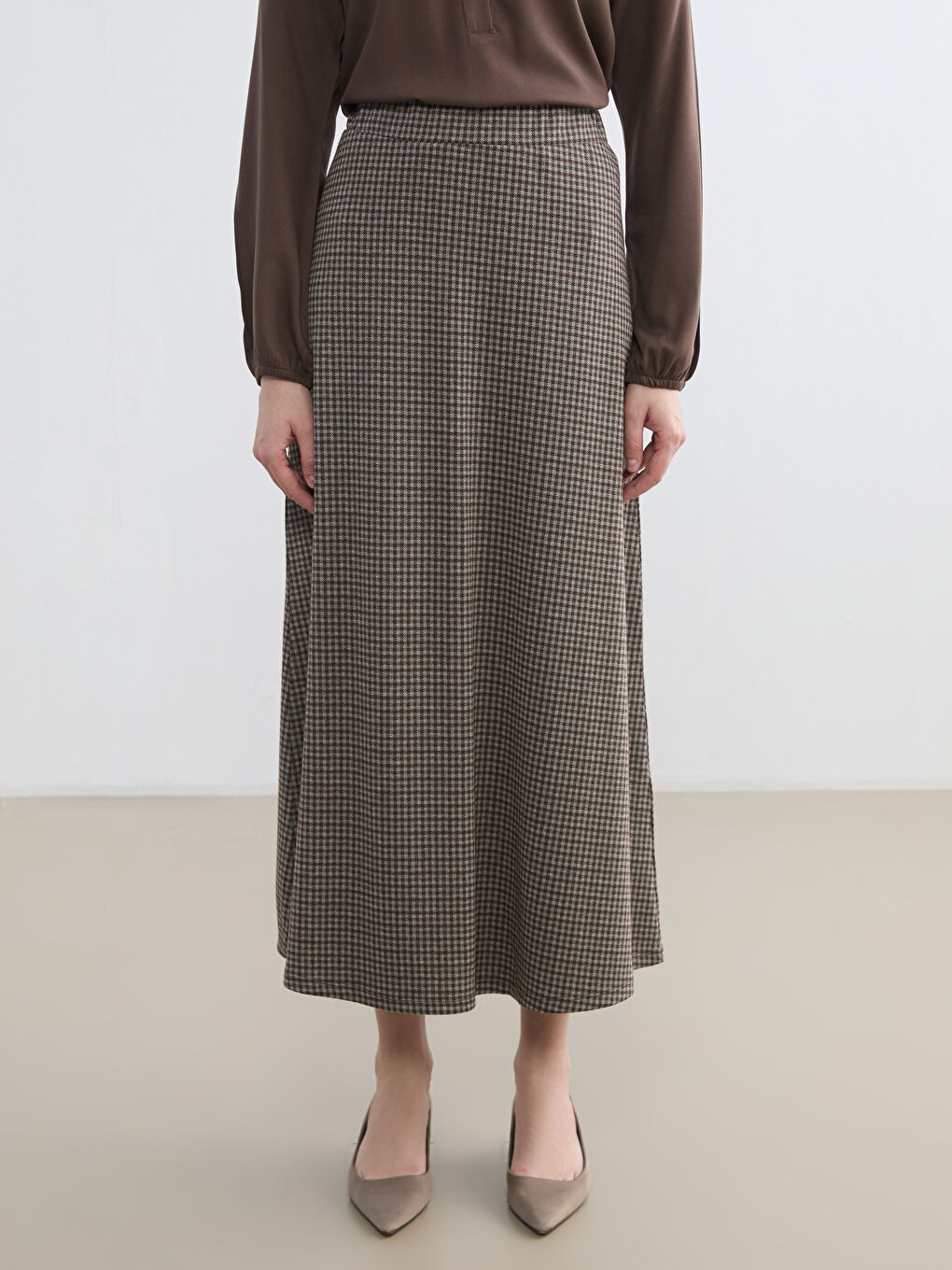 تەنورە قاوه‌یی ژن-1