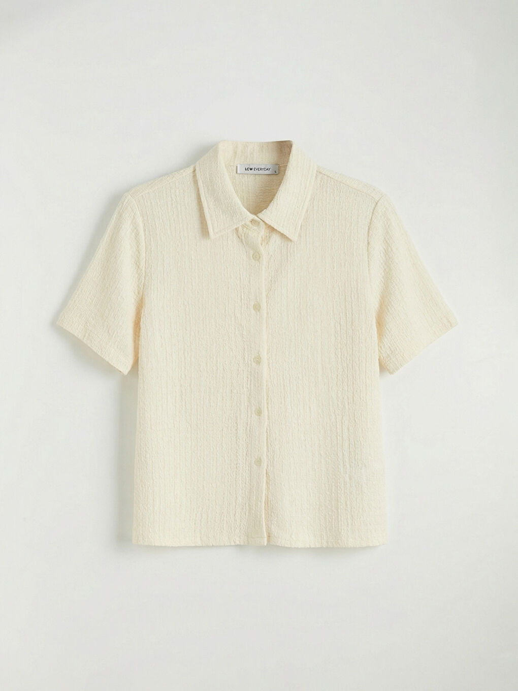 Текстурована блузка з коміром-4