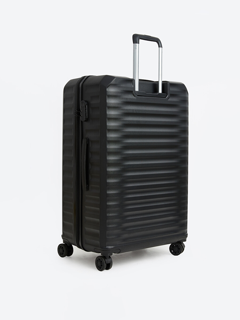The oversized suitcase, punctuated with a lock detail.-1