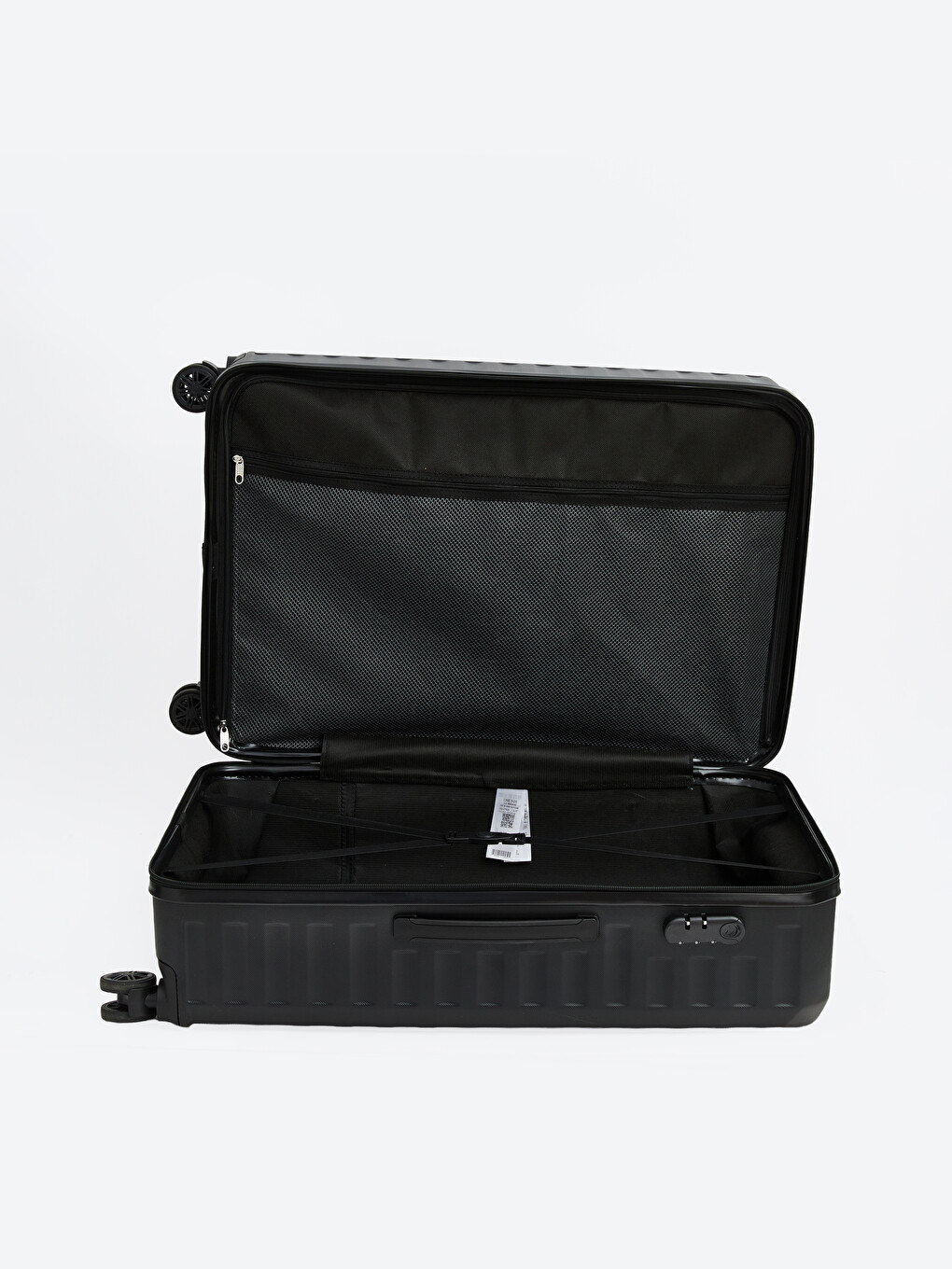 The oversized suitcase, punctuated with a lock detail.-2