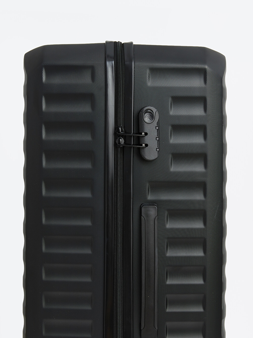 The oversized suitcase, punctuated with a lock detail.-3