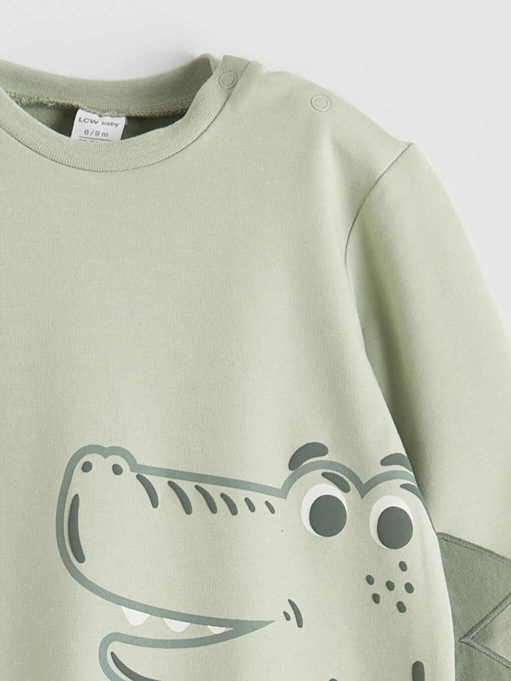 رومبر ولد صغير بطبعة ديناصورات-3