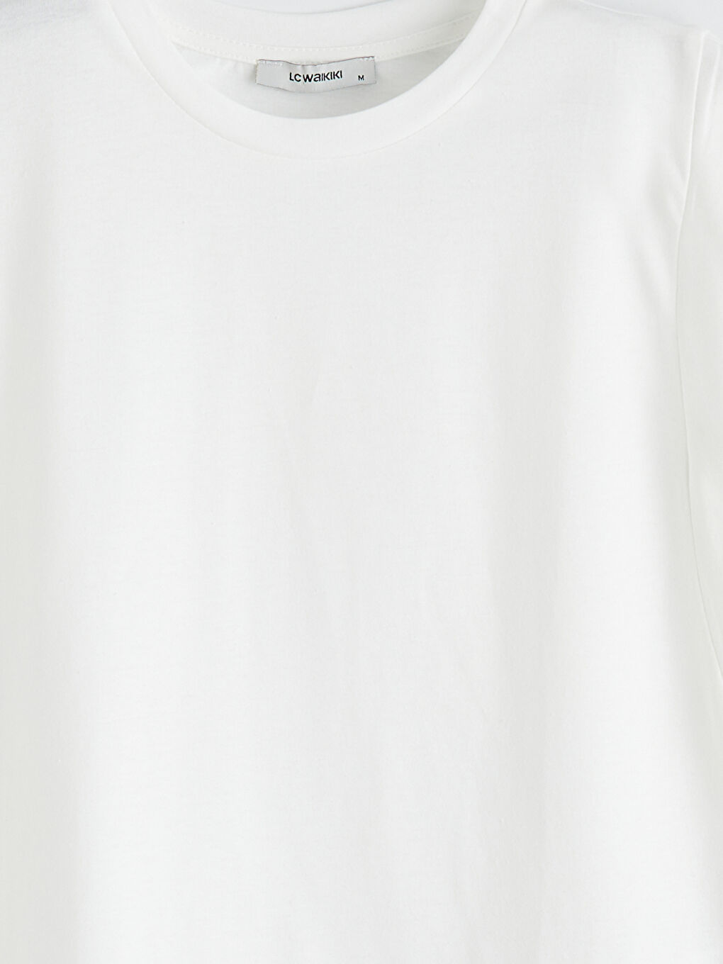 Beyaz Bisiklet Yaka Kolsuz Bluz	-5