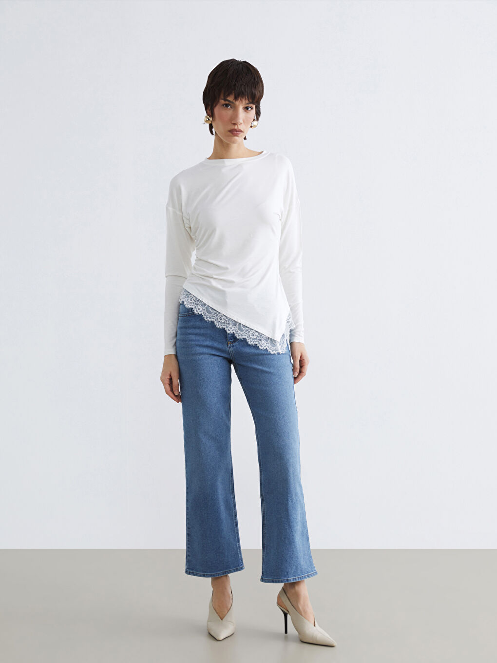 Embrace effortless charm with our lace-detailed, gathered blouse, featuring a classic crew neckline.-1