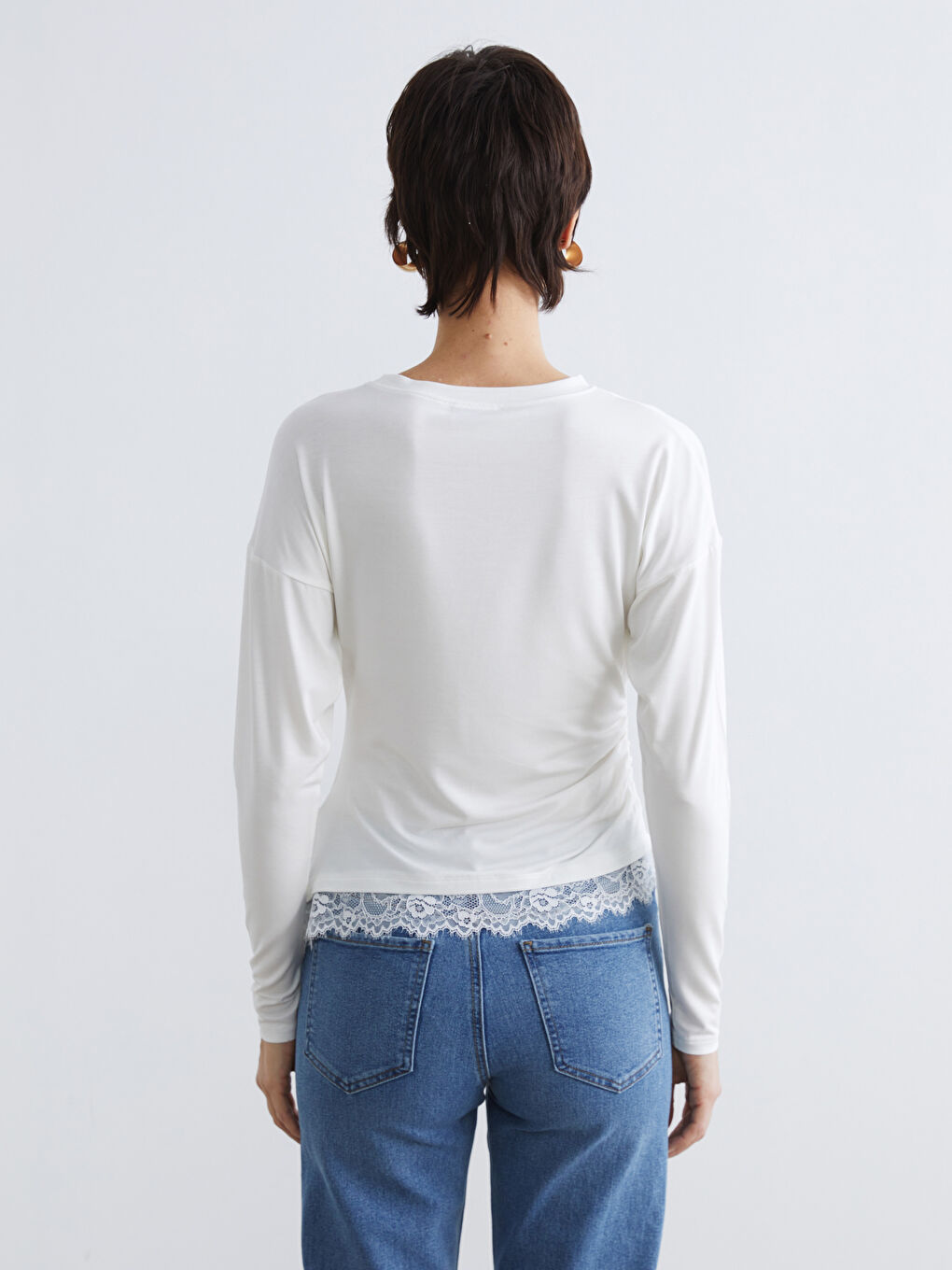 Embrace effortless charm with our lace-detailed, gathered blouse, featuring a classic crew neckline.-3