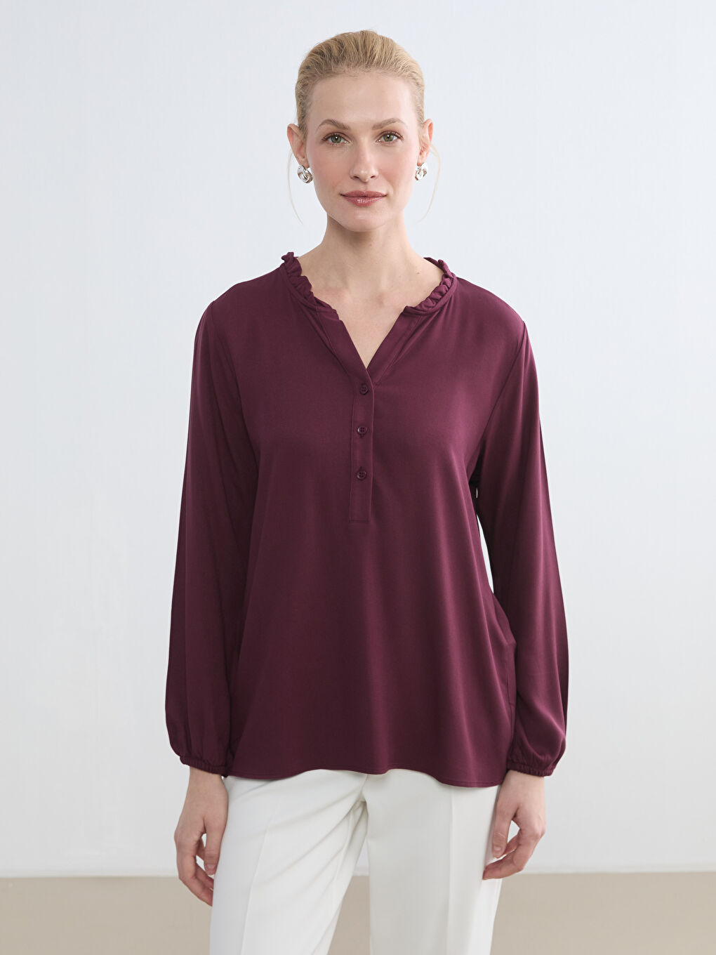 Ruffled Funnel Neck Blouse	
