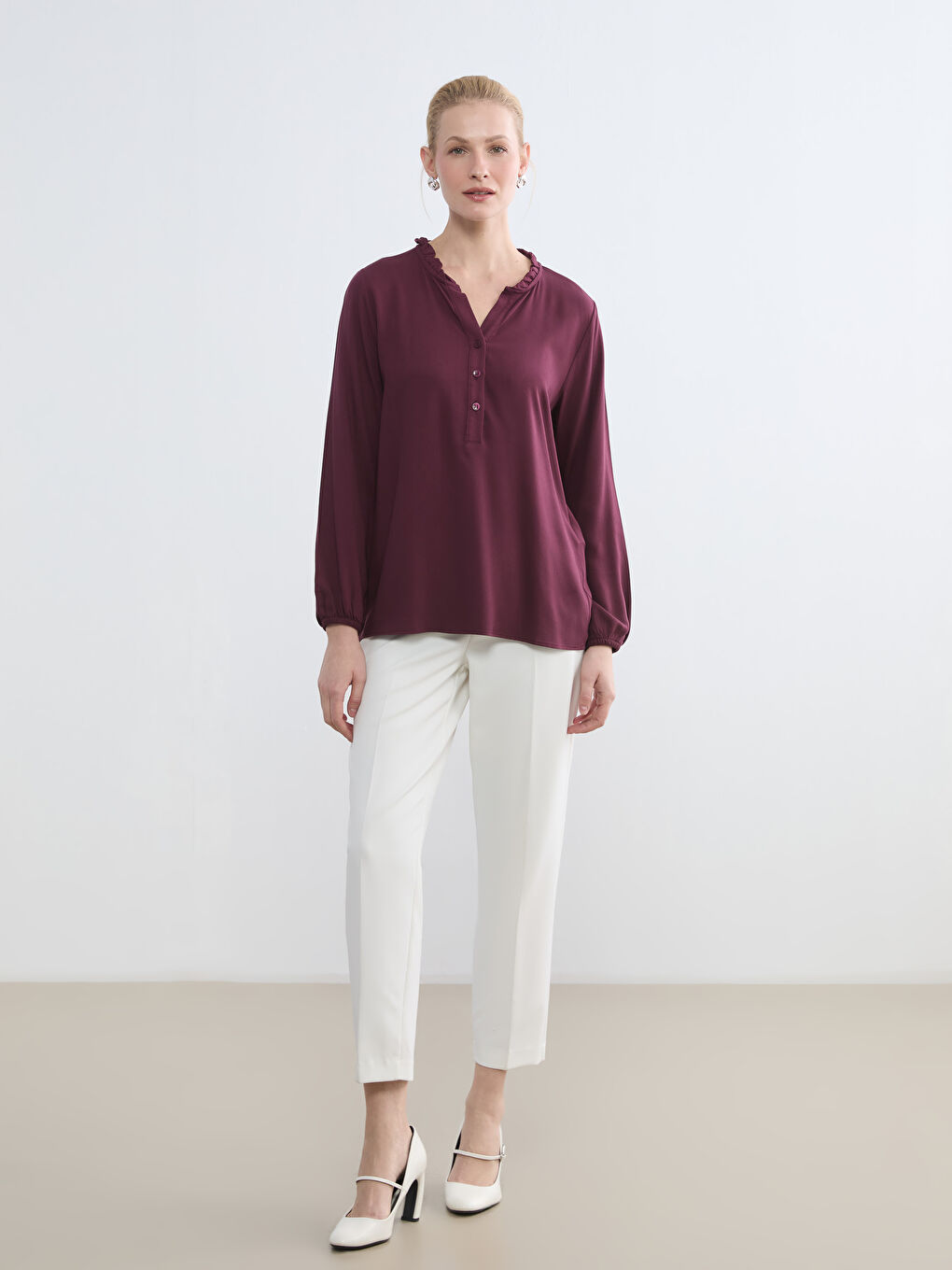 Ruffled Funnel Neck Blouse	
-1