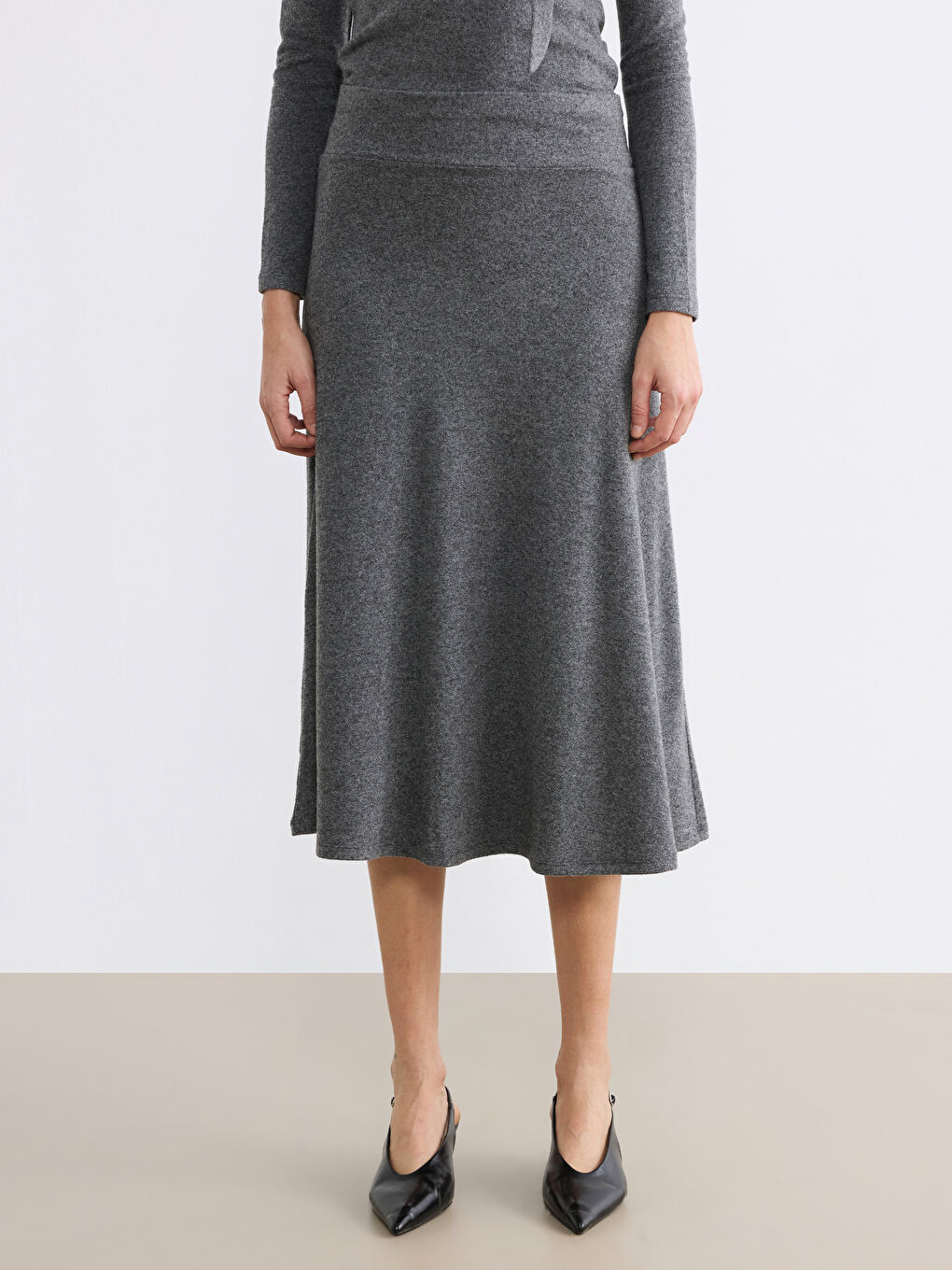 تەنورەی تریكۆی فۆرم بە کەمەر لاستیکی.-1