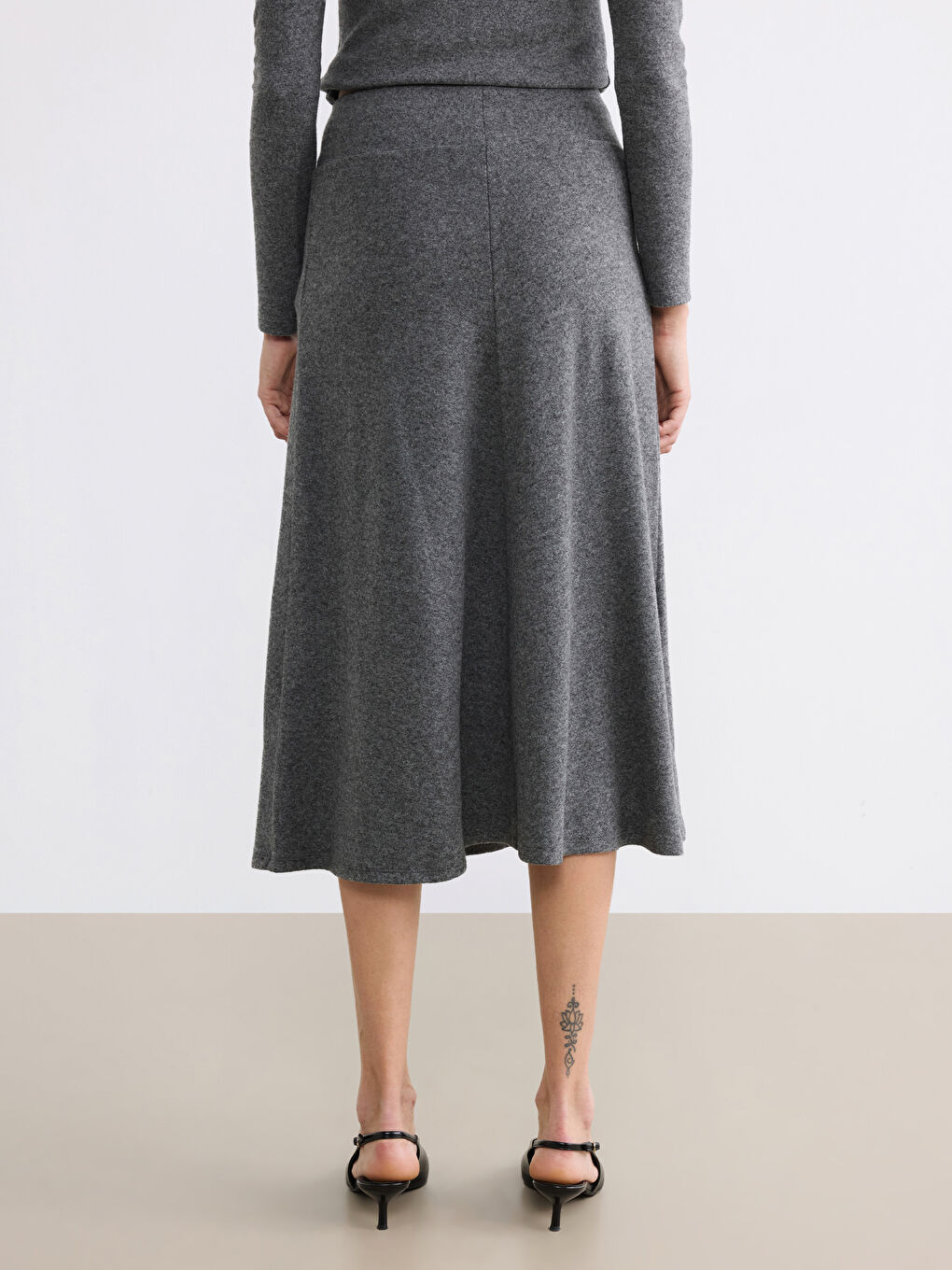 تەنورەی تریكۆی فۆرم بە کەمەر لاستیکی.-3