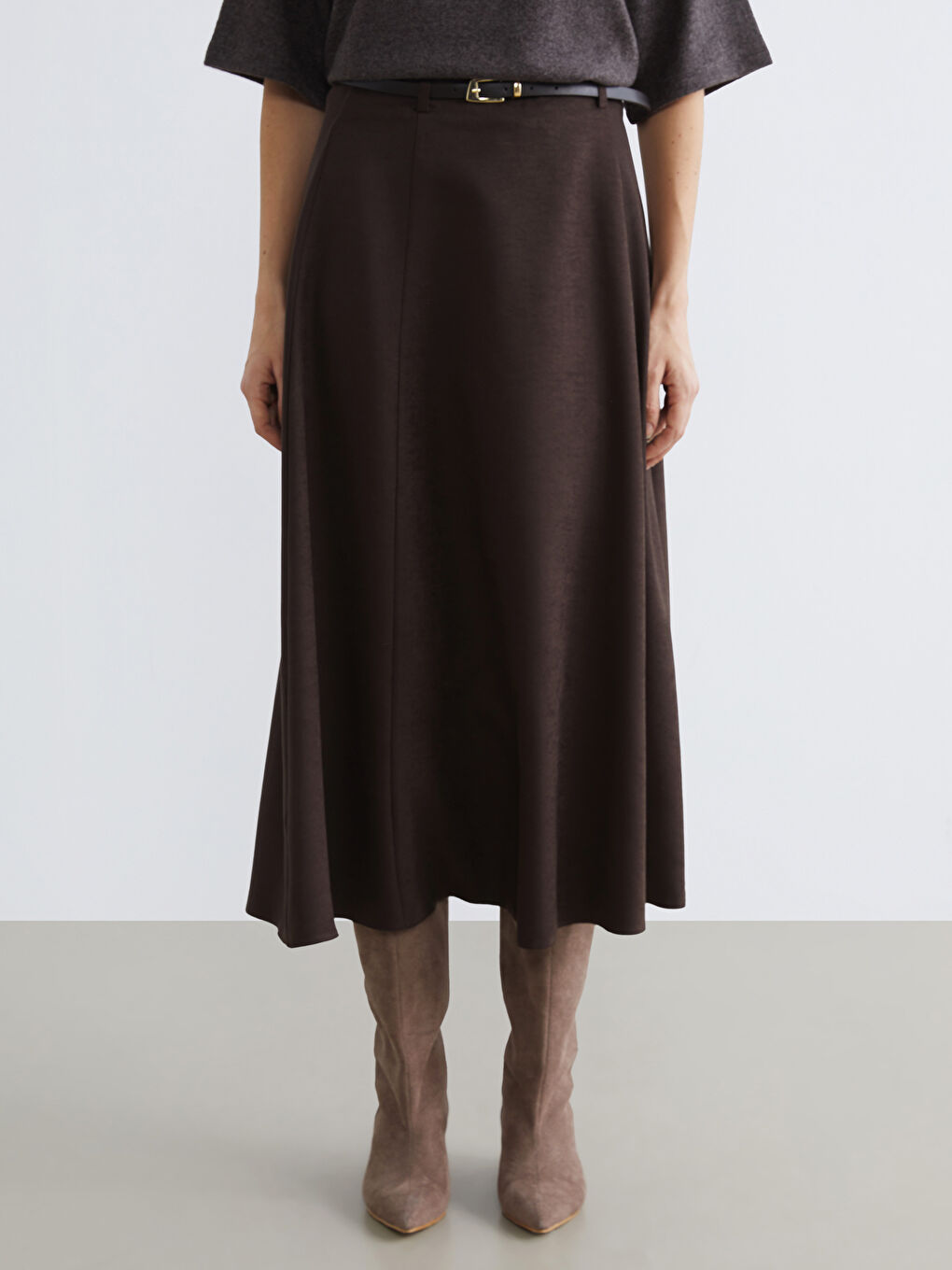 A-line, faux-suede skirt with a belted waist.-1