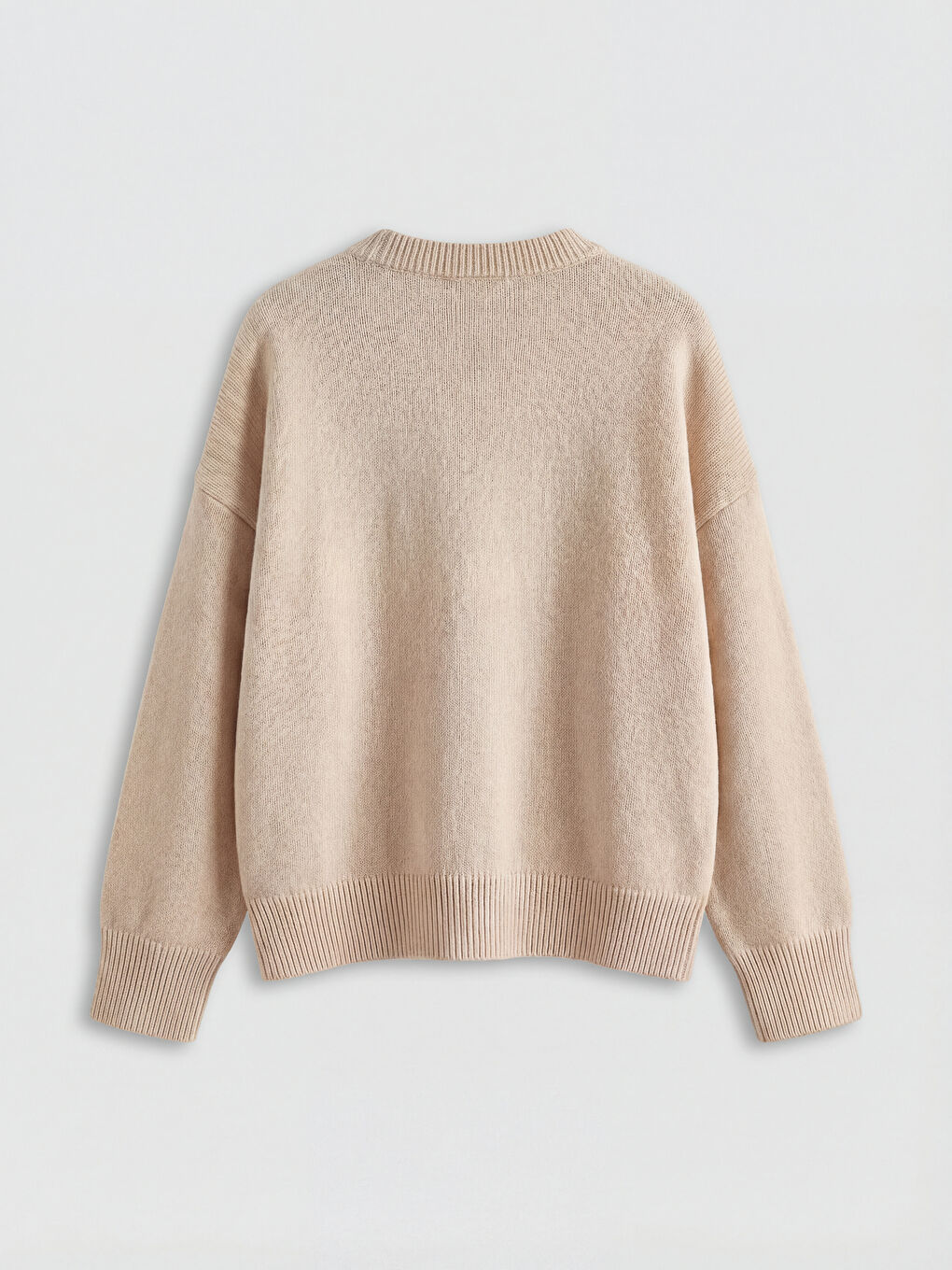 سترة تريكو نسائية بياقة دائرية-1