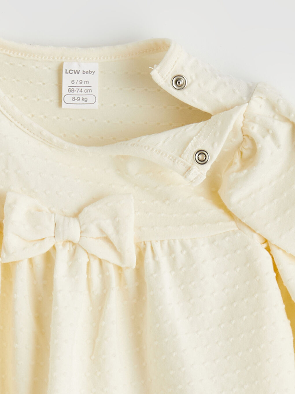 Ekru Bisiklet Yaka Fiyonklu Kız Bebek Tulum-1
