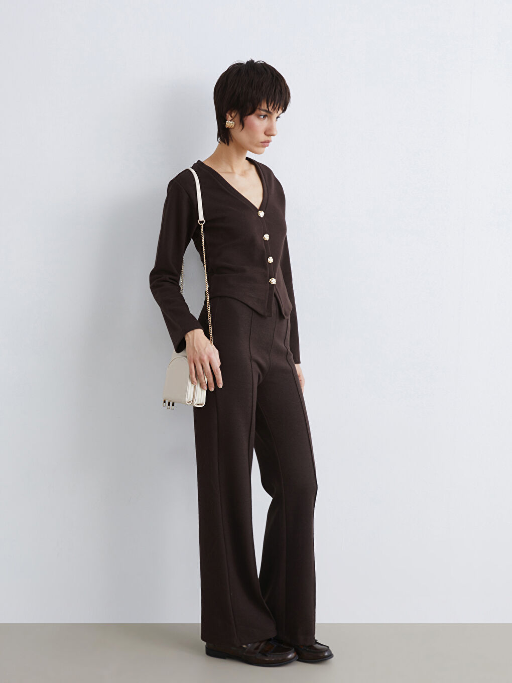 Effortless elegance meets everyday comfort in our wide-leg knit trousers, designed with a flattering elasticated waist.