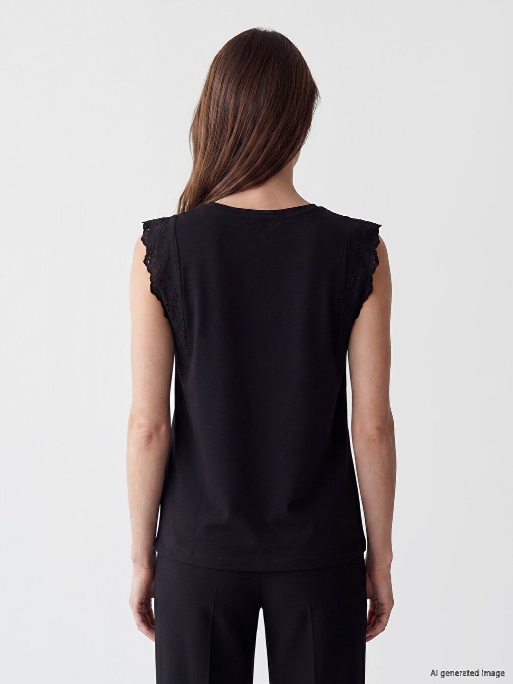 Bluza sa okruglim izrezom, vezenim detaljima i volanima-3