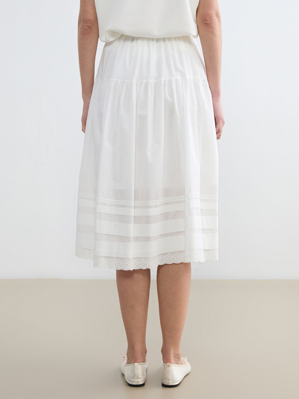 Ženska suknja sa elastičnim strukom i širokim krojem-3