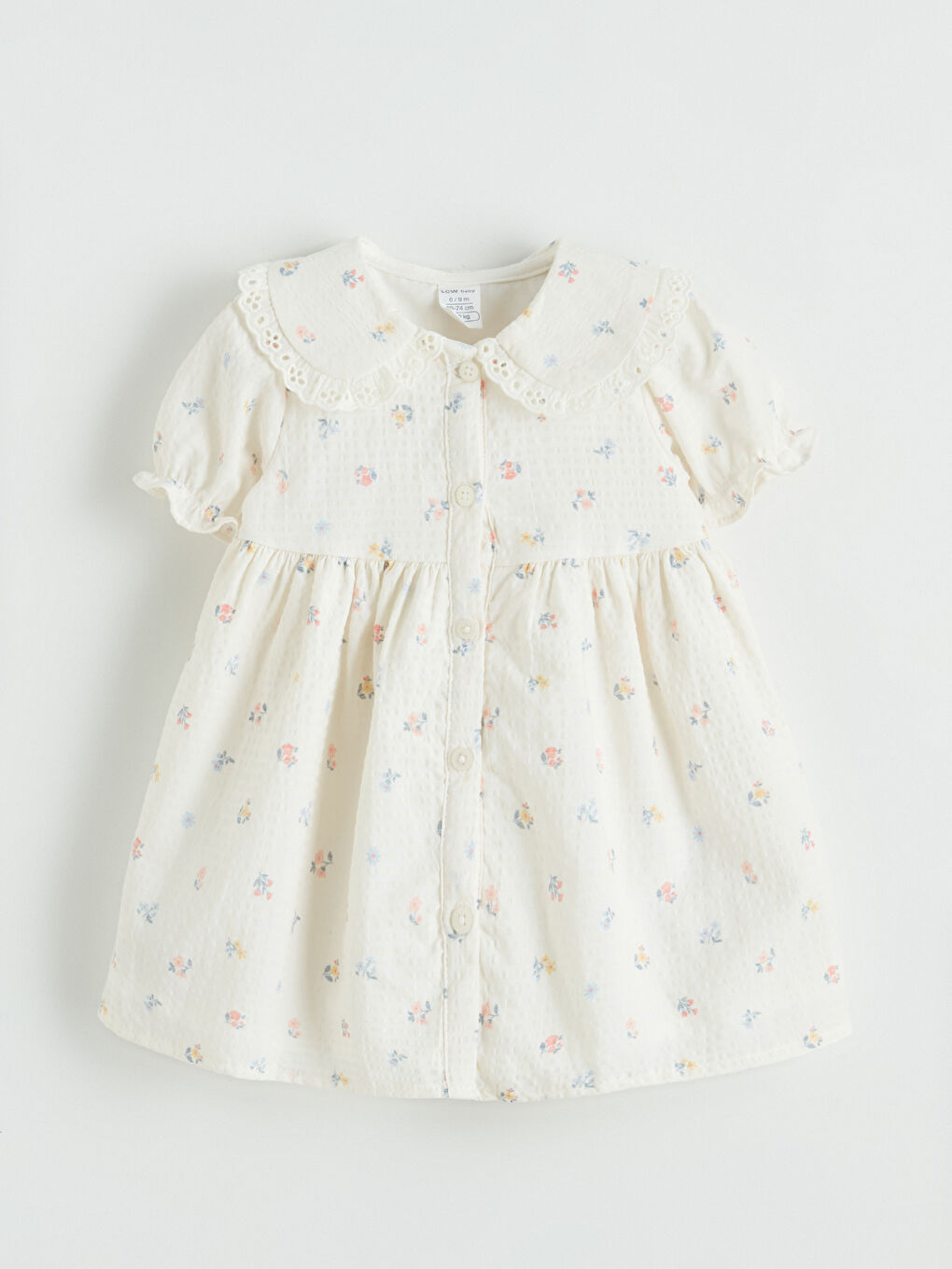 Bej Bebe Yaka Çiçek Desenli Kız Bebek Elbise