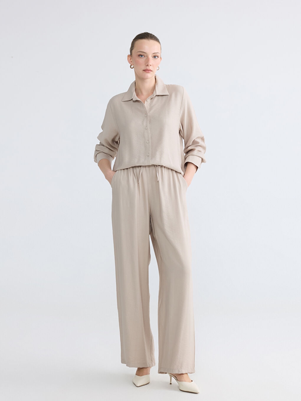 Bej Beli Lastikli Dokulu Kadın Pantolon