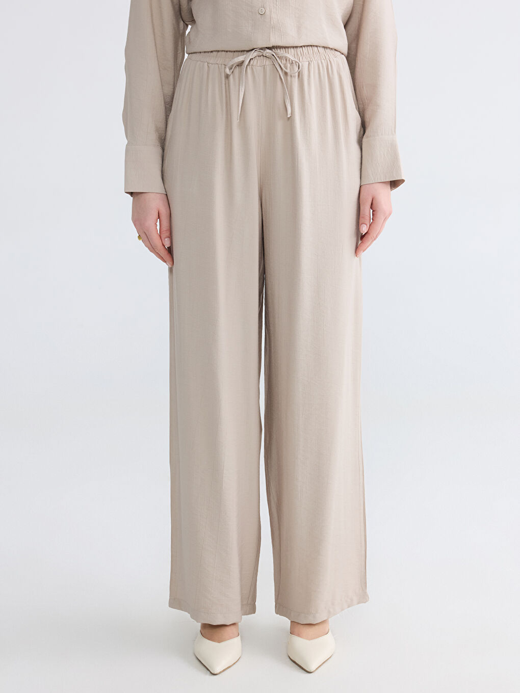 Bej Beli Lastikli Dokulu Kadın Pantolon-1