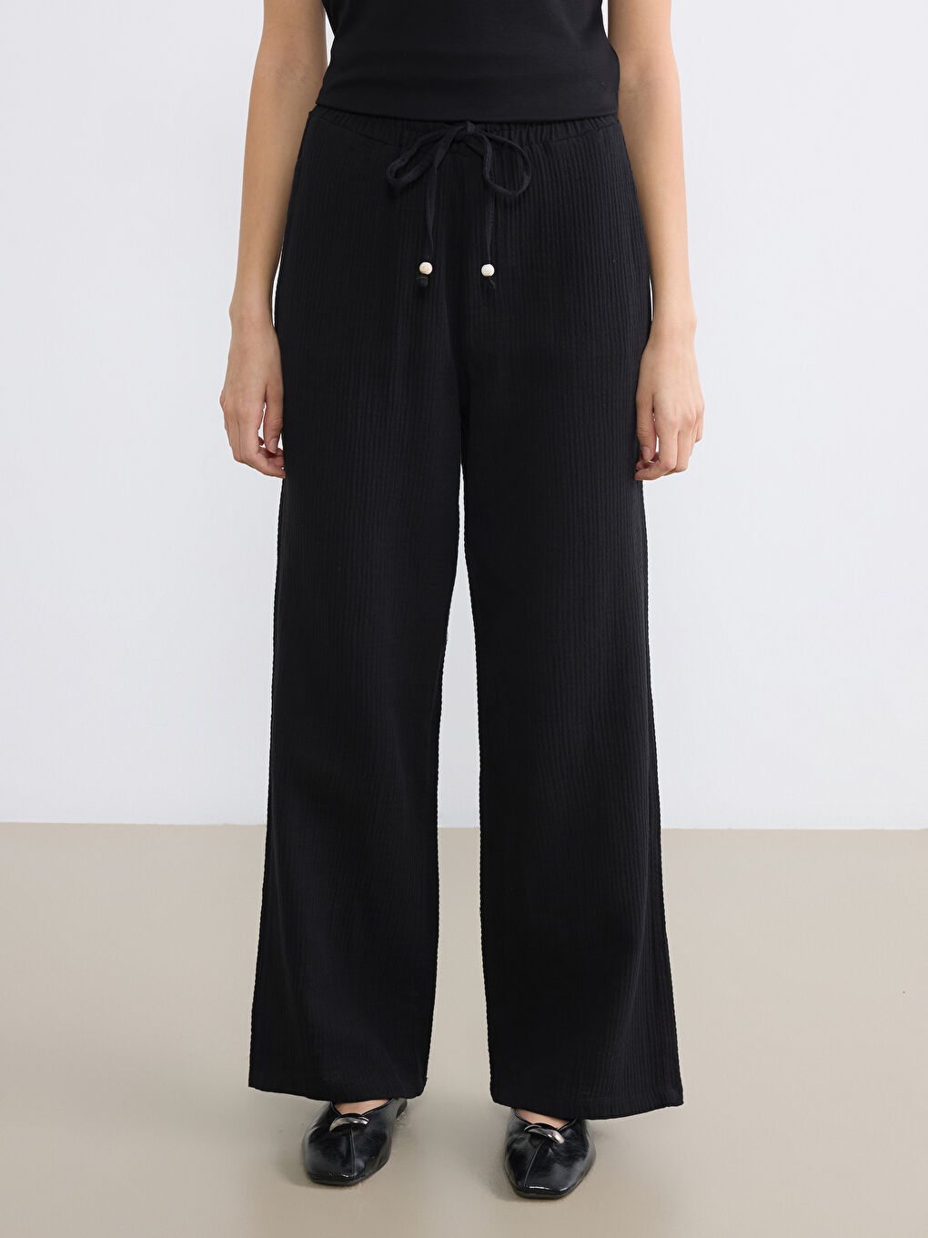 Siyah Beli Lastikli Geniş Paça Müslin Kadın Pantolon-1