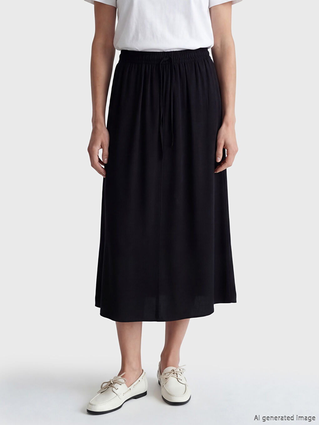 Siyah Beli Lastikli Kloş Etek	-1