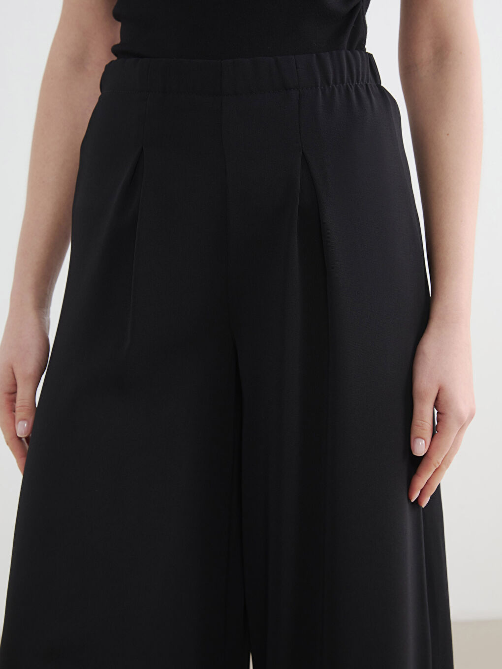 پانتۆڵی قوماشی چین‌کراوی ژنانه بە کەمەر لاستیکی-2