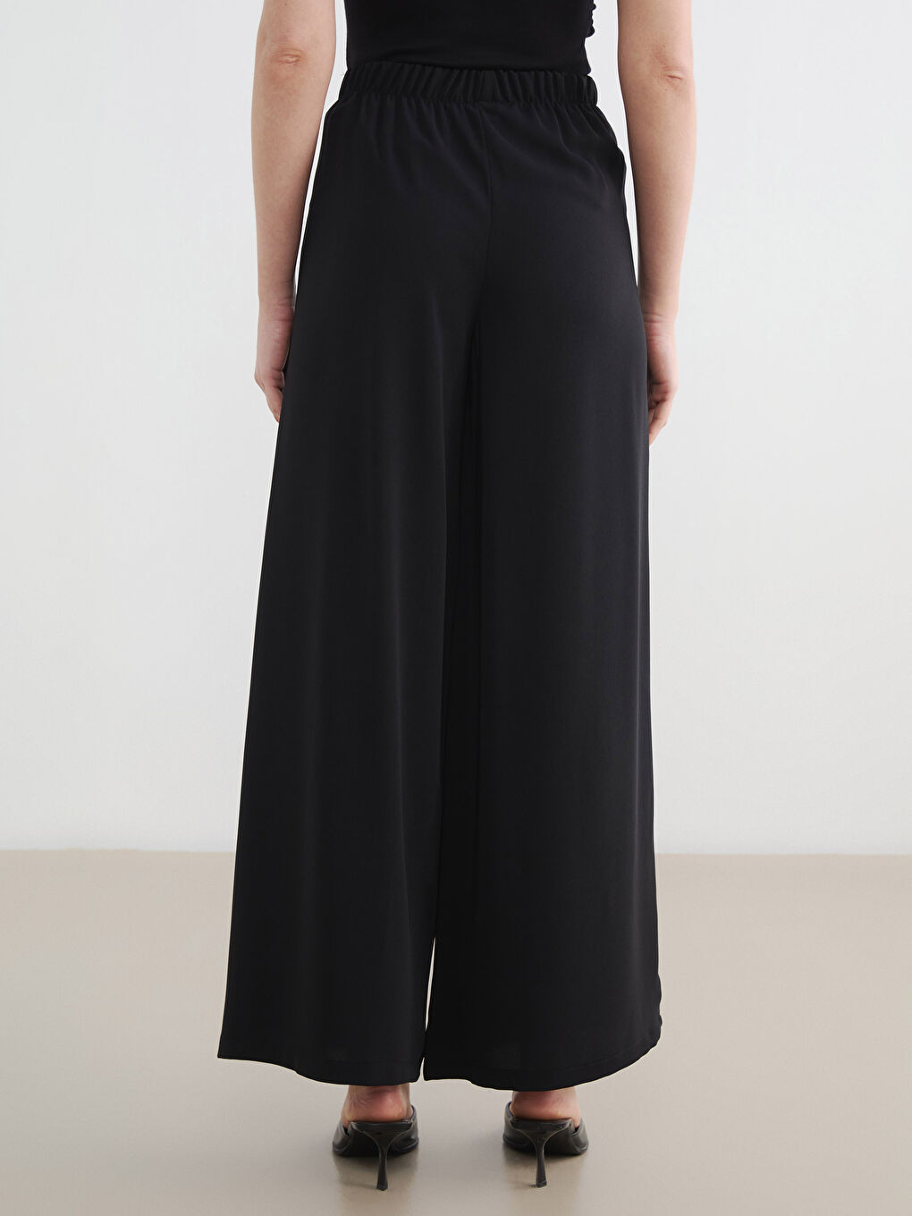 پانتۆڵی قوماشی چین‌کراوی ژنانه بە کەمەر لاستیکی-3